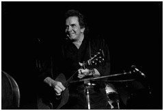 [Johnny Cash in concert]